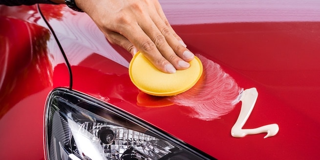 Apply car waxing paste