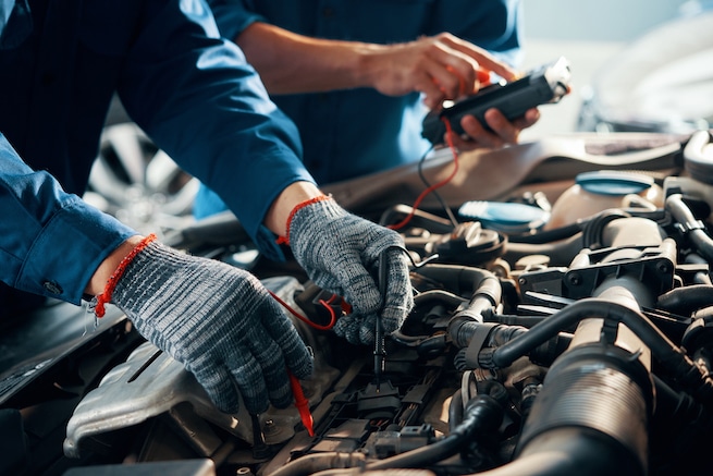 Automobile battery test done by a mechanic