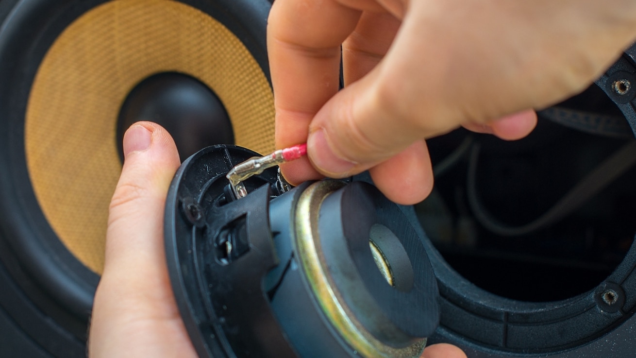 An image showing loose or damaged connections in speaker wires